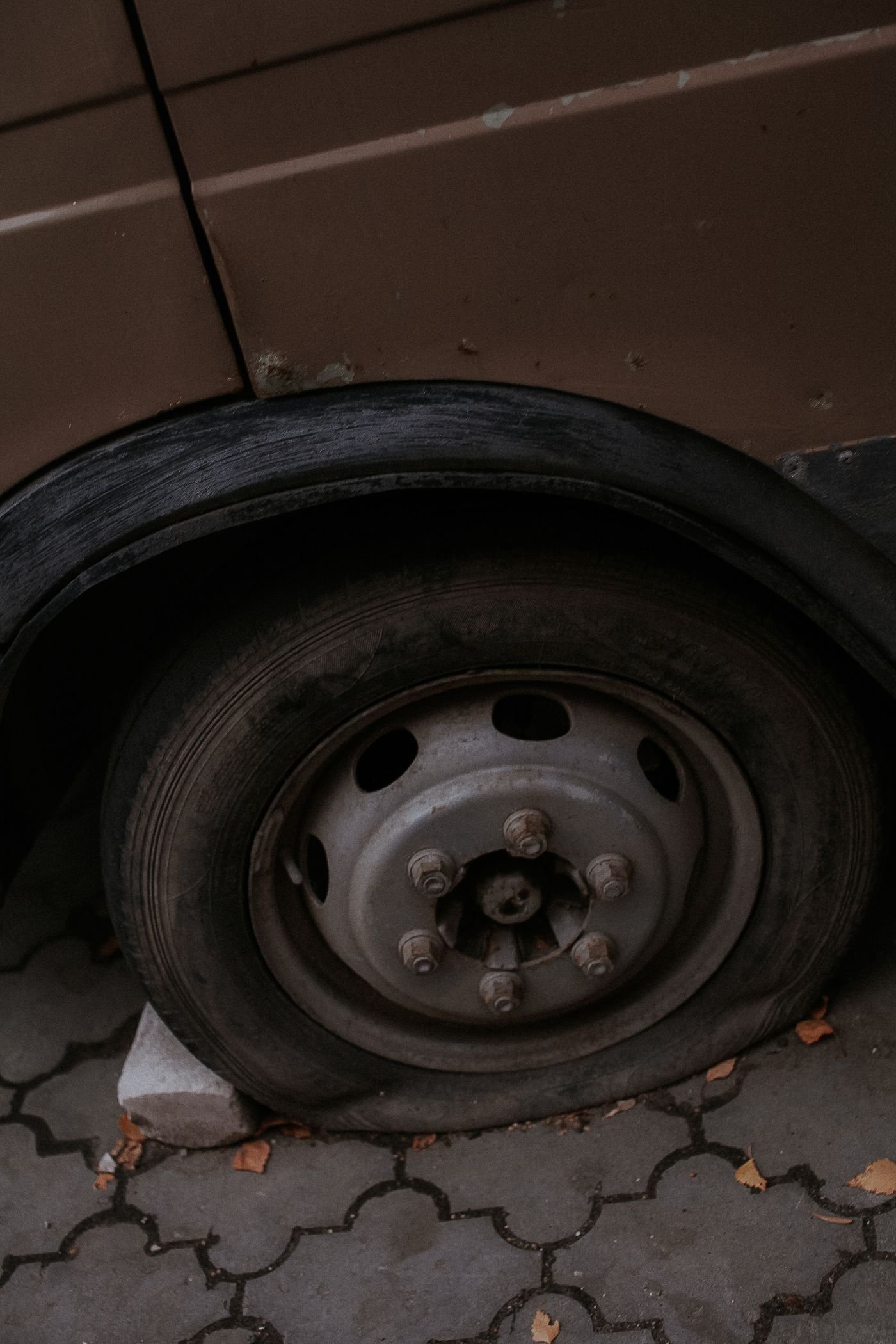 Flat tire at the side of a road